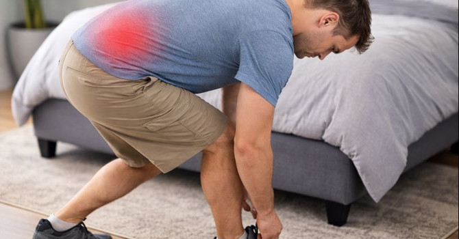 Bending Over to Put on Shoes, Pick Up a Laundry Basket, or Put on Pants image